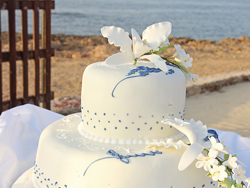 The wedding cake with the Mediterranean Sea in the background