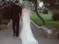 Lauren and Chris leaving the garden amd making their way to the wedding dinner