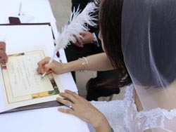 Sylvia and Brad - Signing the wedding documents